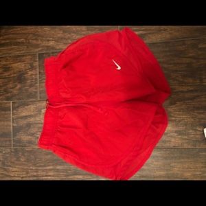 red nike shorts